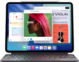 iPad Air displaying Home page with multiple Apple apps, paired with Magic Keyboard and Apple Pencil Pro